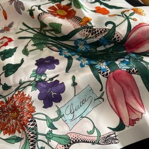 Gucci floral silk scarf. With sales memo and tag.